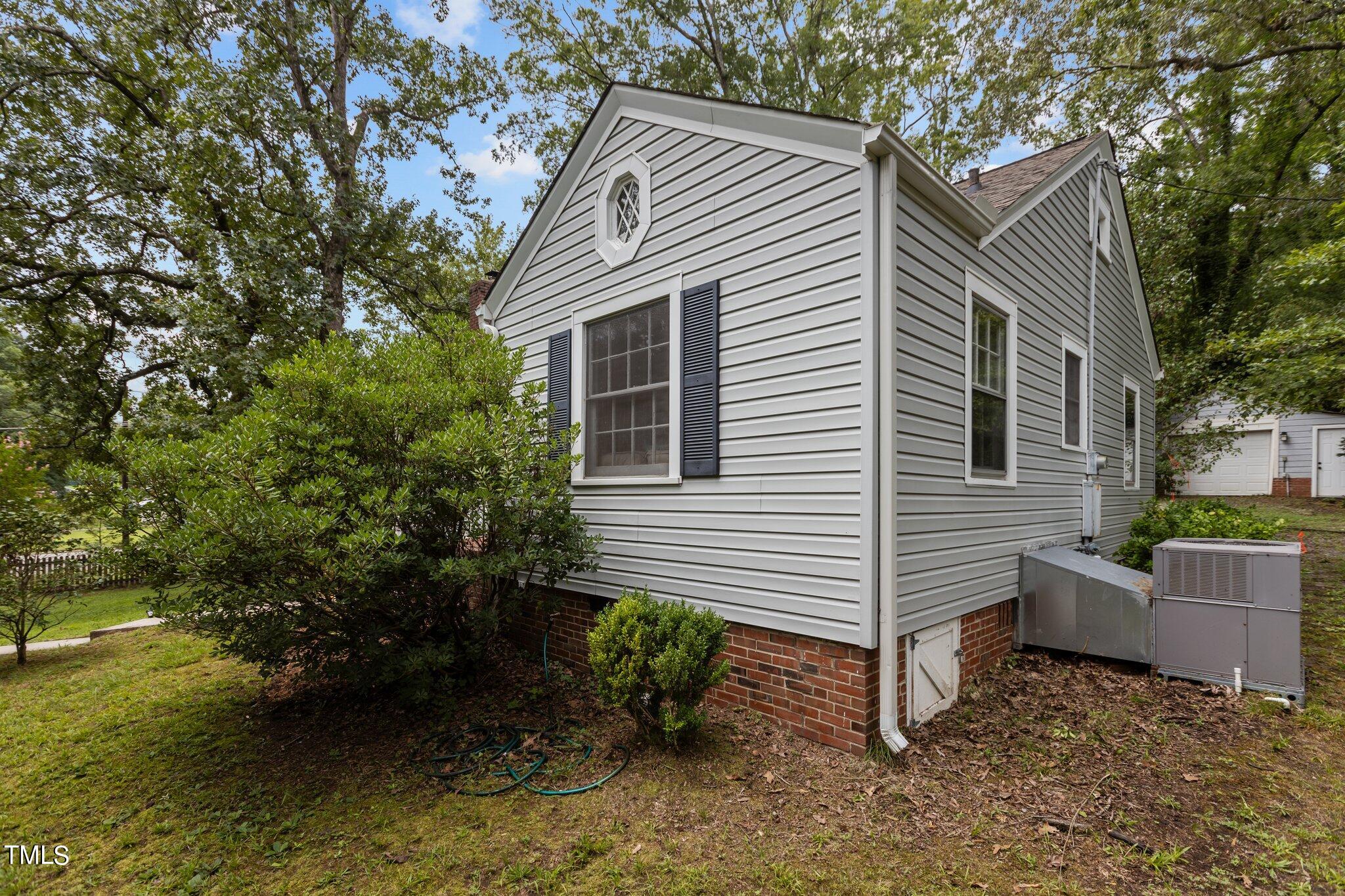 1702 James Street Durham, NC 27707 - Photo 28 of 40 a front view of a house with garden