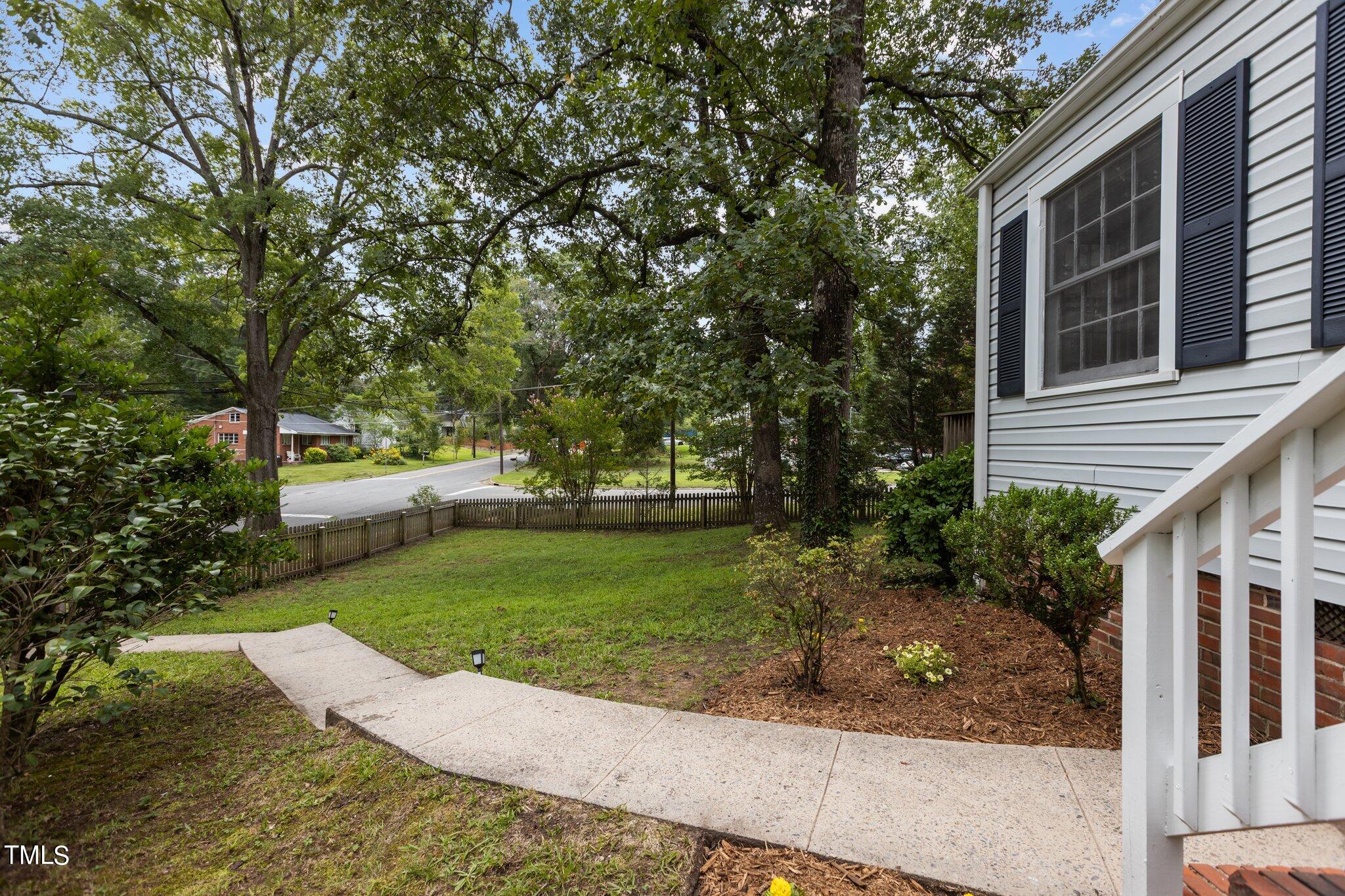 1702 James Street Durham, NC 27707 - Photo 3 of 40 a view of a house with a yard