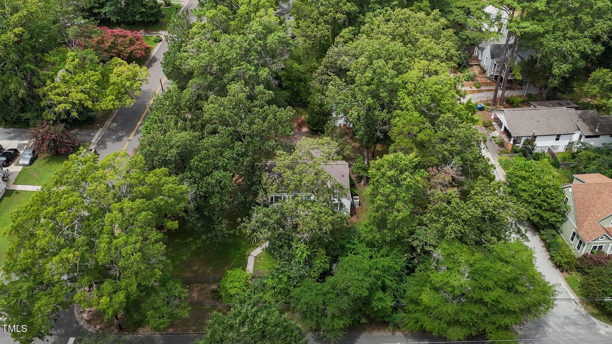 1702 James Street Durham, NC 27707 - Photo 38 of 40 an aerial view of residential house with outdoor space and trees all around