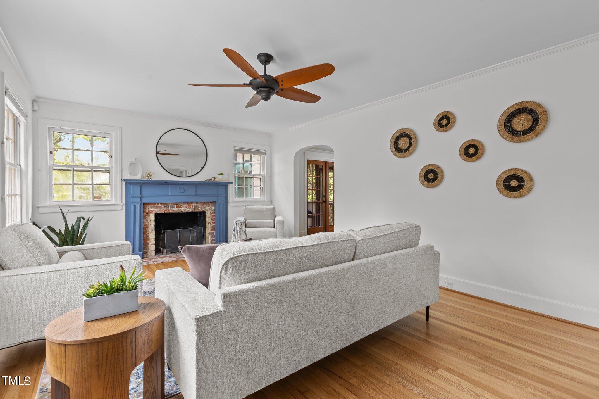 1702 James Street Durham, NC 27707 - Photo 5 of 40 a living room with furniture and a fireplace