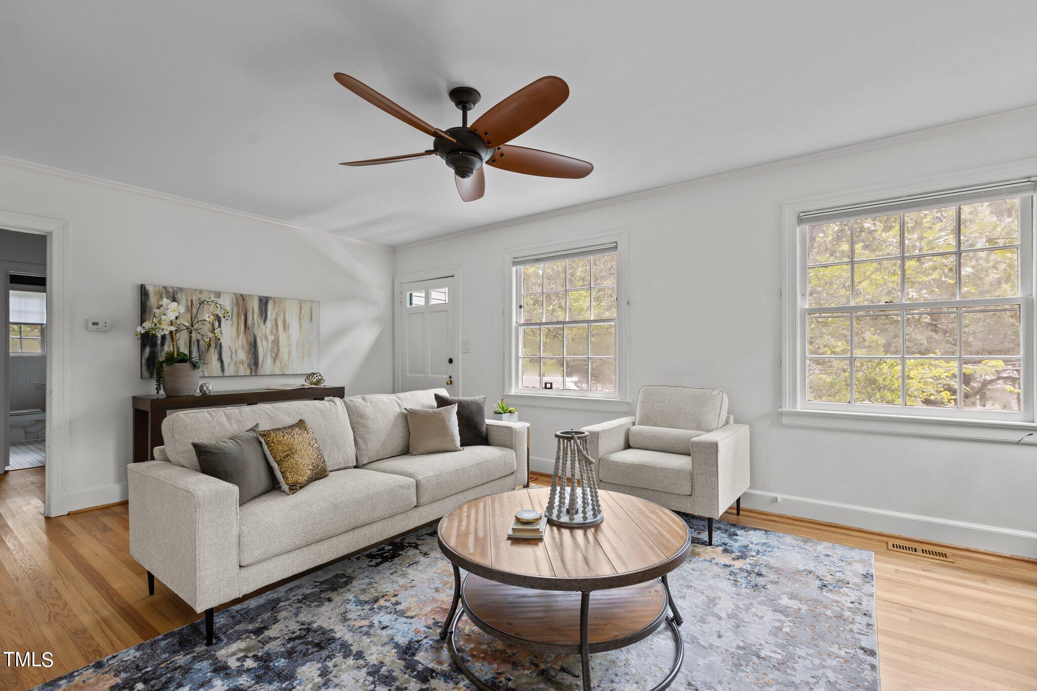 1702 James Street Durham, NC 27707 - Photo 7 of 40 a living room with furniture and a window
