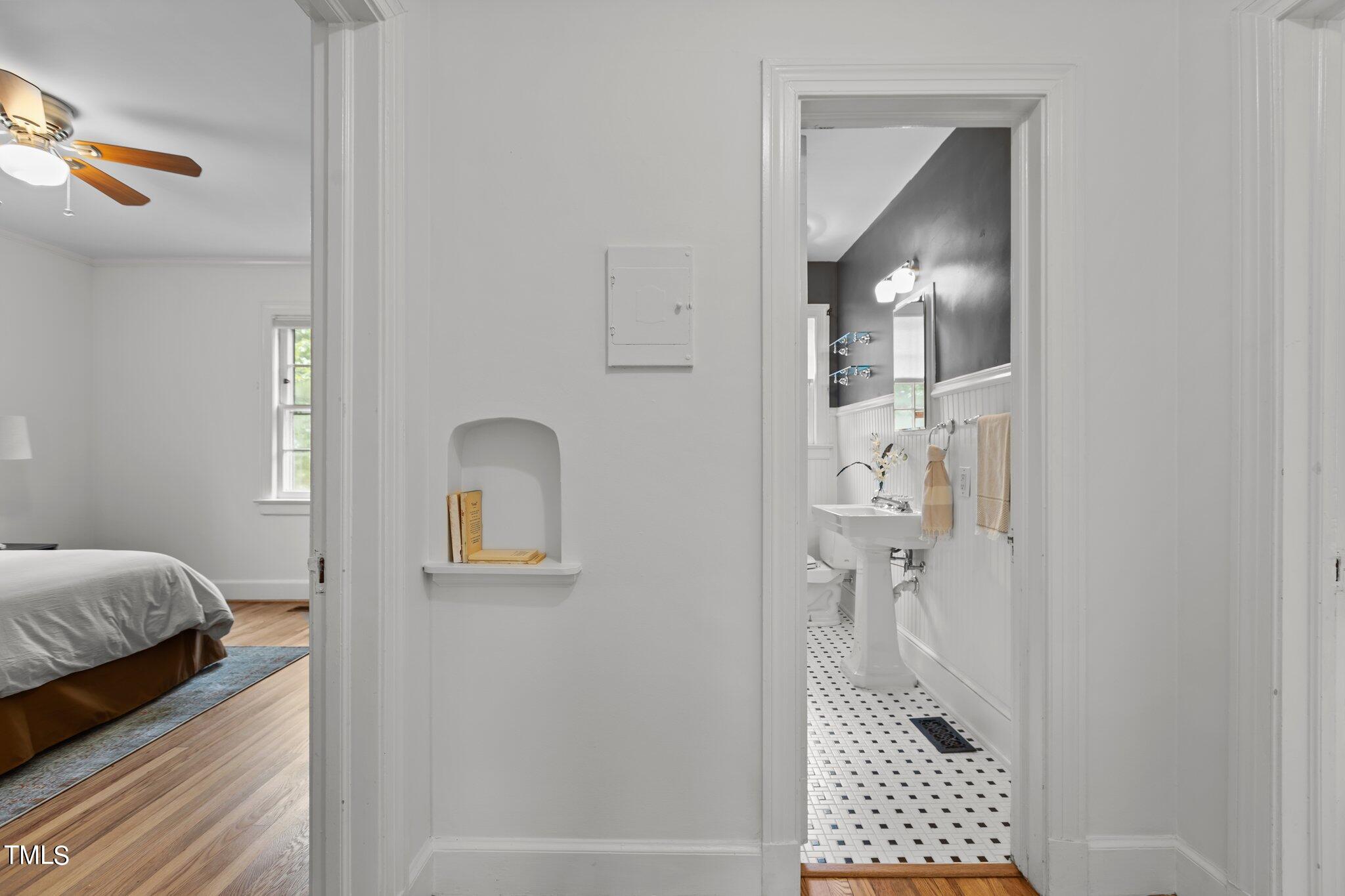1702 James Street Durham, NC 27707 - Photo 10 of 40 a bathroom with a sink and a mirror