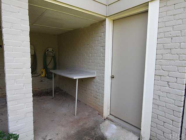 227 Glascock Street Raleigh, NC 27604 - Photo 14 of 17 Exterior door to walk -in crawl space under deck