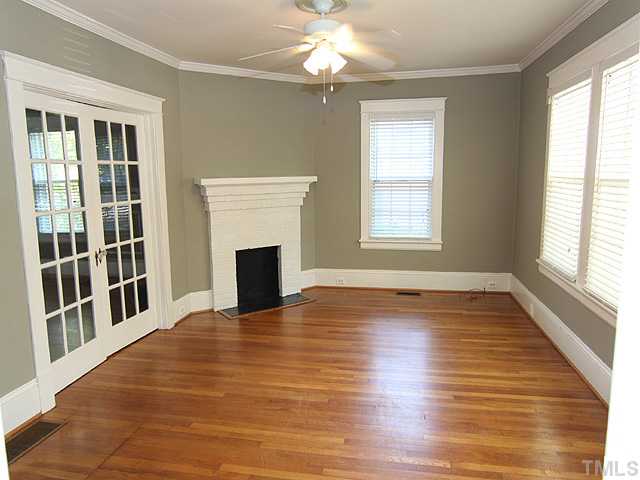227 Glascock Street Raleigh, NC 27604 - Photo 4 of 17 Formal living room with french doors to dining room