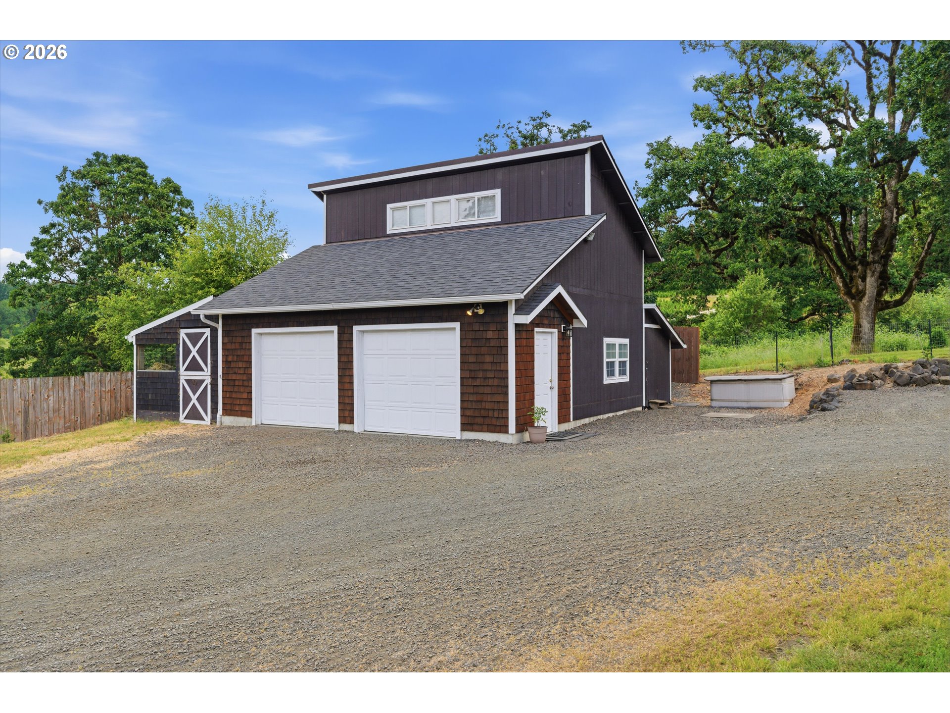 13880 McCaleb Road Monmouth, OR 97361 - Photo 39 of 44 a front view of a house with a yard and garage