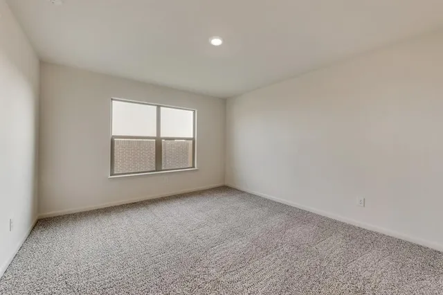an empty room with window