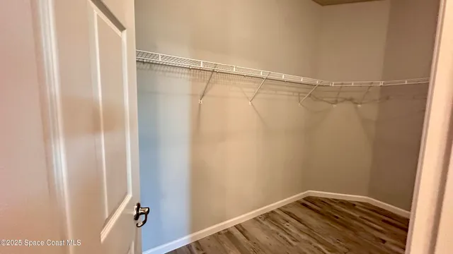 a view of a bathroom from a hallway