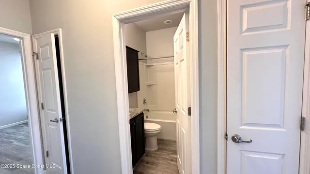 a view of swimming pool from a balcony