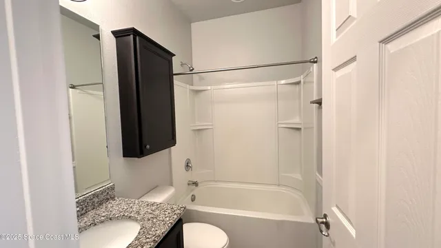 a view of a house with a swimming pool