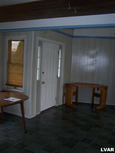646 Georgetown Road Nazareth, PA 18064 - Photo 7 of 29 a room with wooden floor and windows