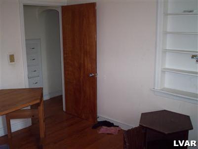 646 Georgetown Road Nazareth, PA 18064 - Photo 8 of 29 a view of room with window and wooden floor