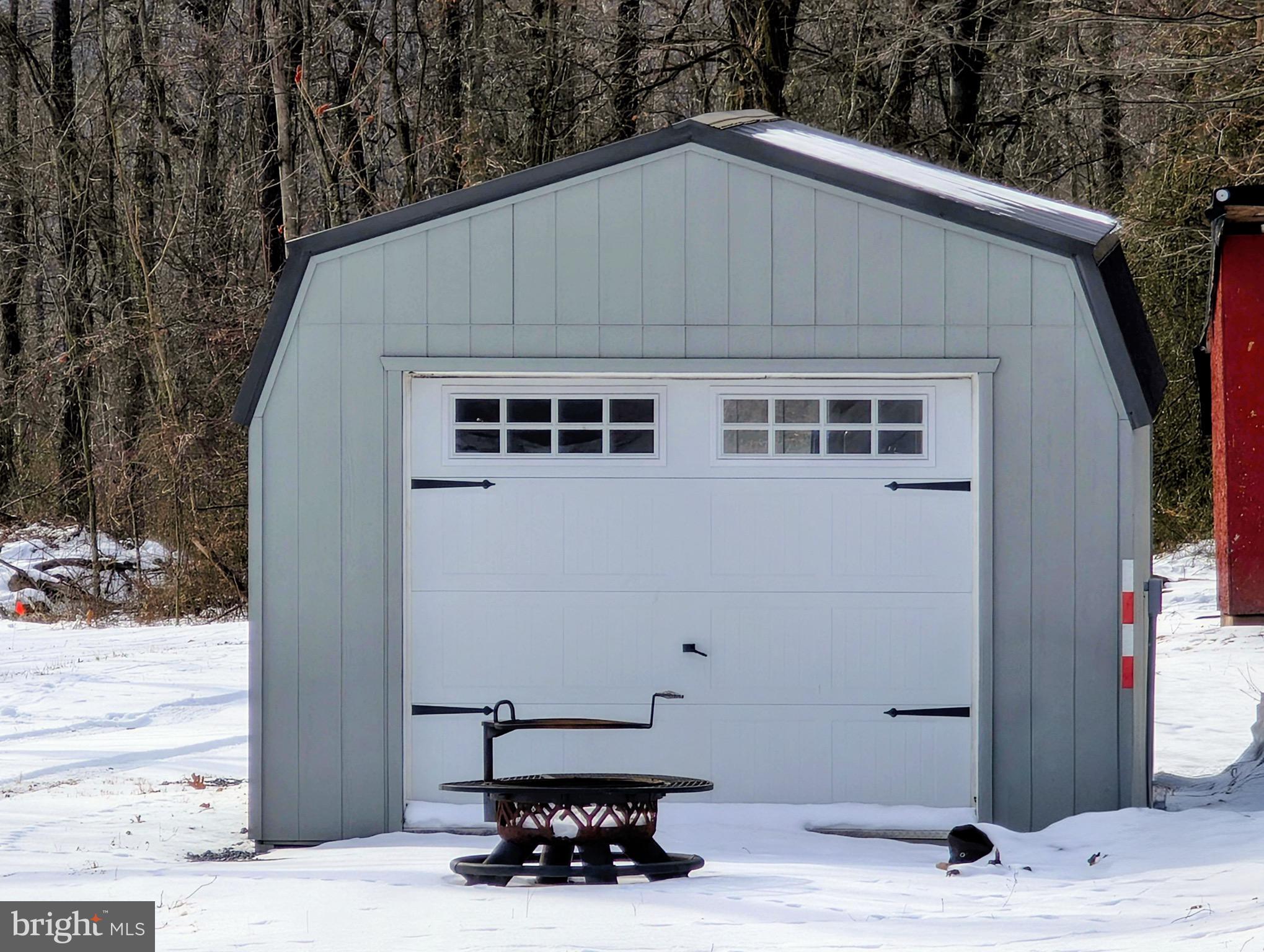 247 Short Cut Road Alum Bank, PA 15521 - Photo 14 of 15 a house with trees in the background