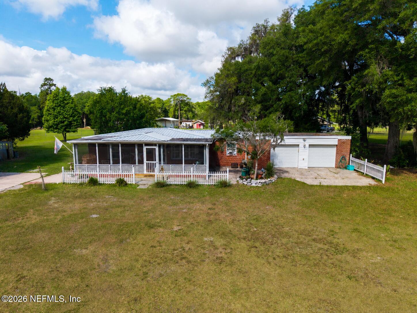 155 Roddy Road Palatka, FL 32177 - Photo 1 of 41 a view of a house with a swimming pool