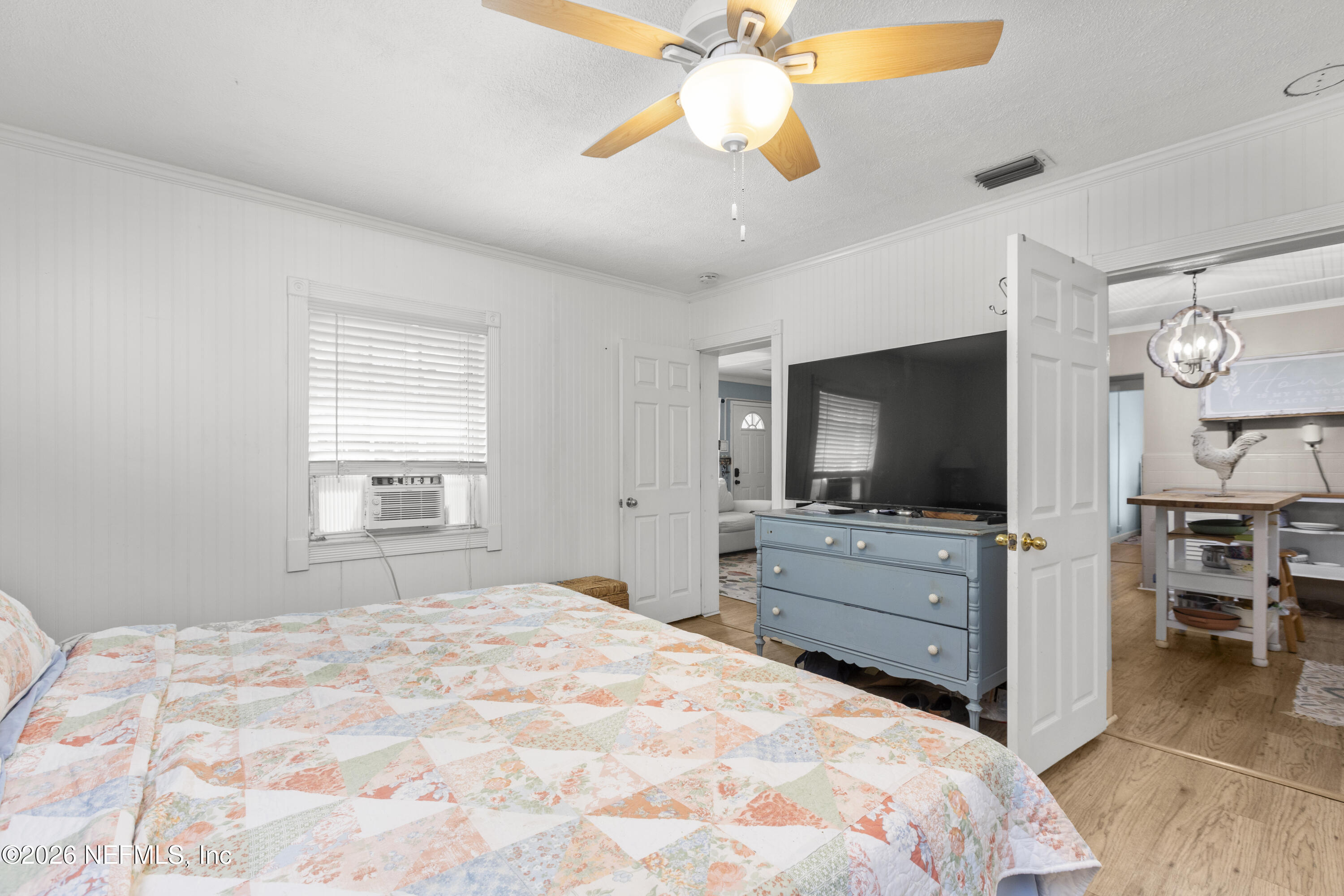 155 Roddy Road Palatka, FL 32177 - Photo 19 of 41 a bedroom with a bed and a flat screen tv