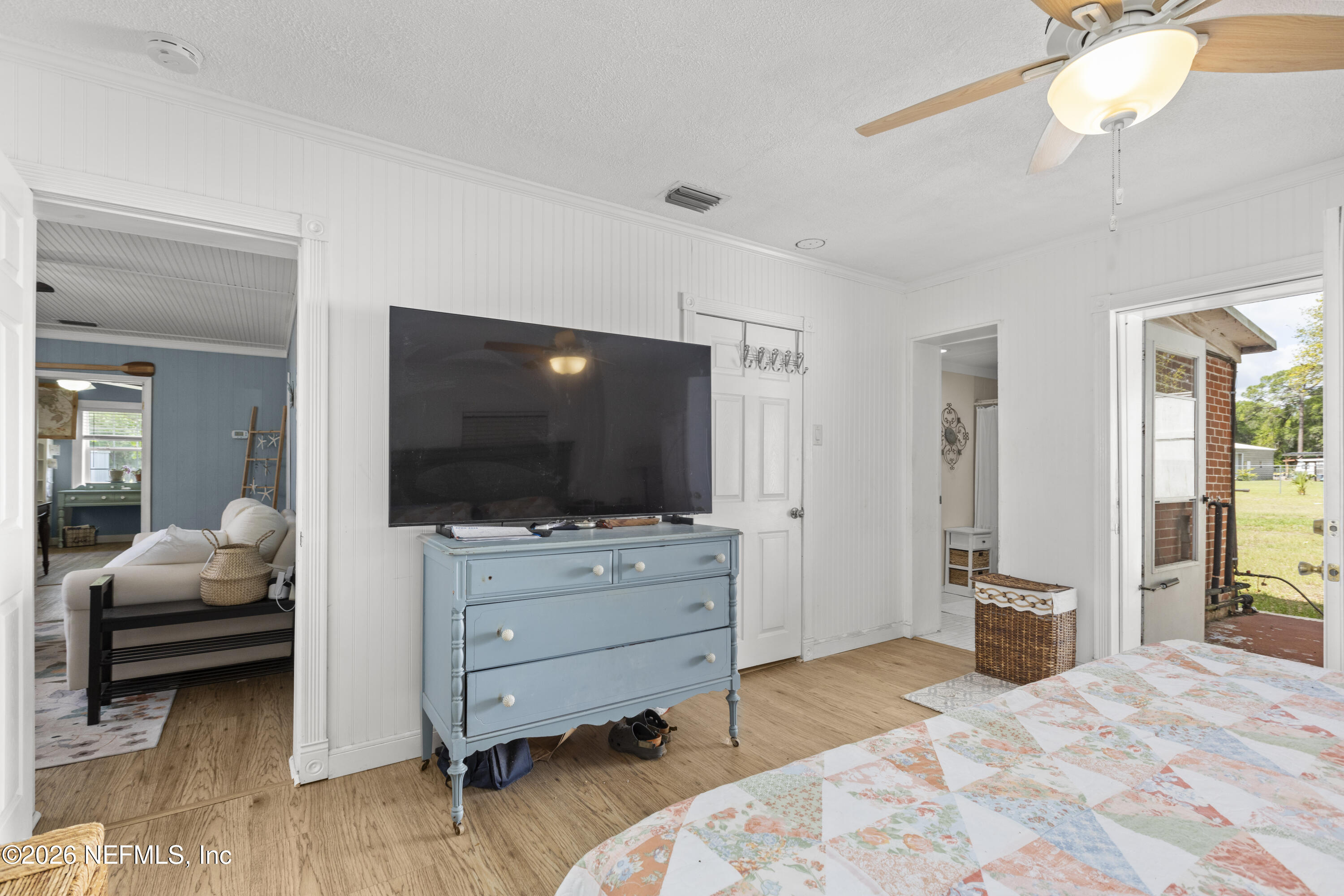 155 Roddy Road Palatka, FL 32177 - Photo 22 of 41 a bedroom with furniture and flat screen tv
