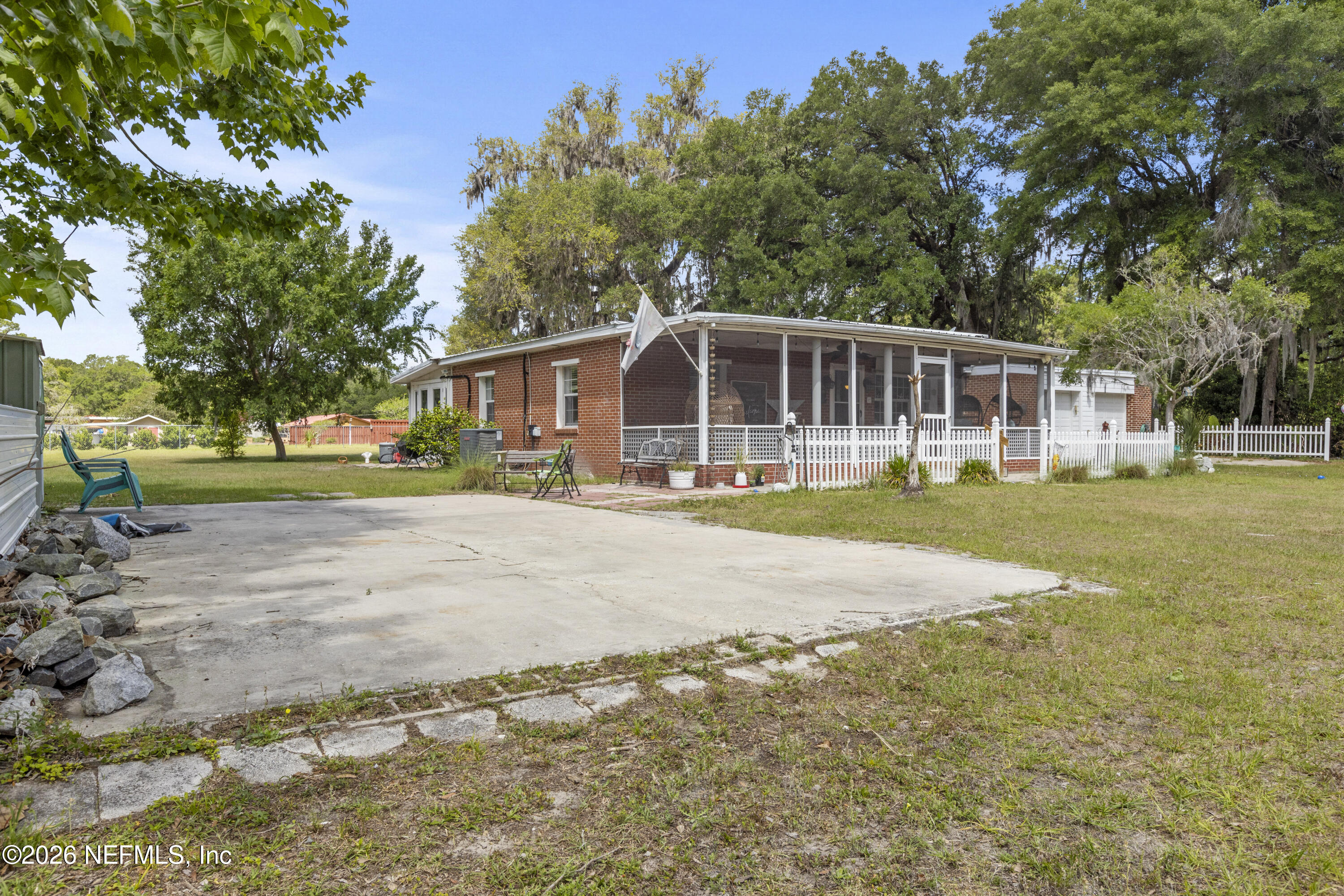 155 Roddy Road Palatka, FL 32177 - Photo 24 of 41 a front view of a house with a yard and trees