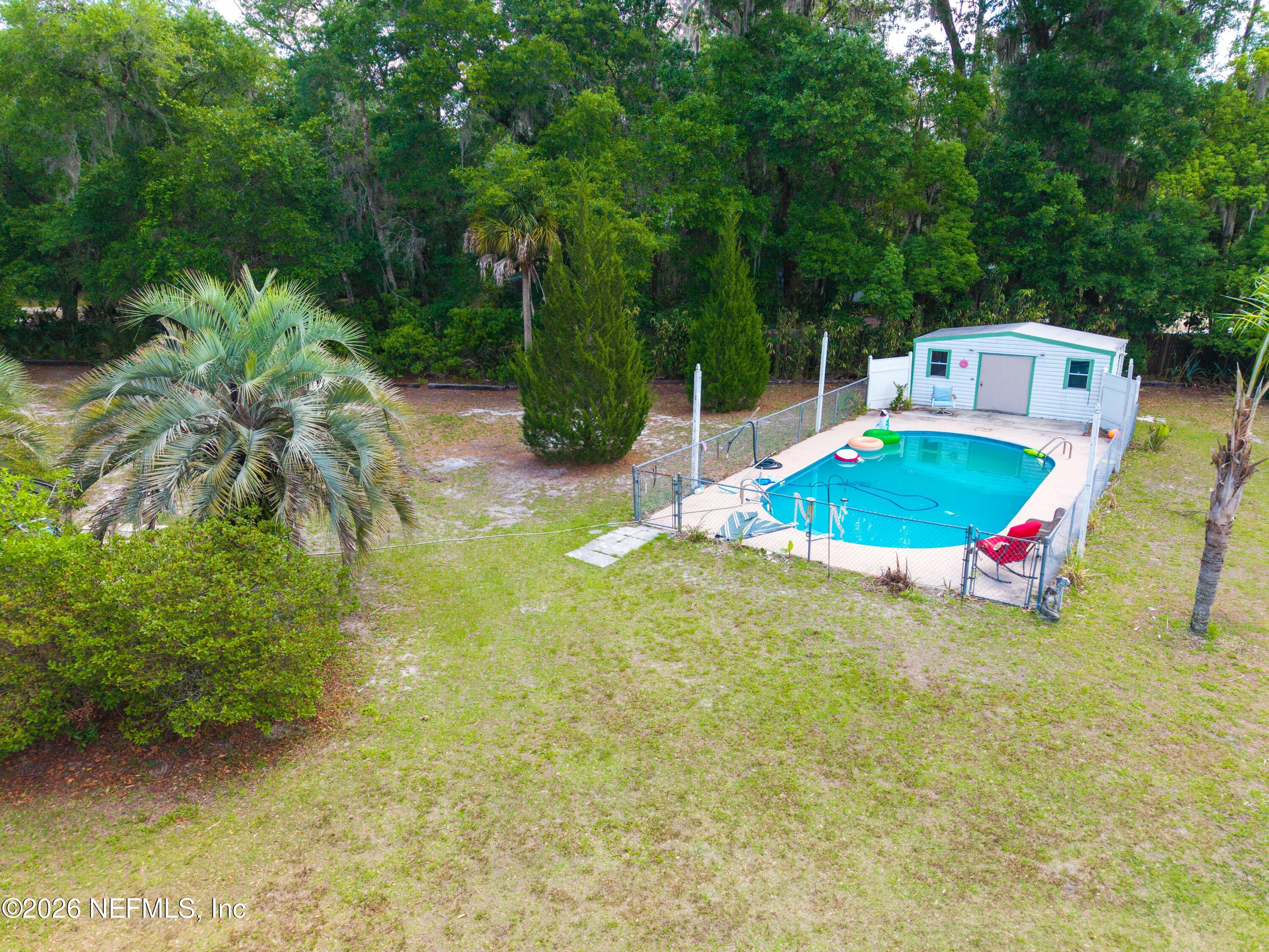155 Roddy Road Palatka, FL 32177 - Photo 32 of 41 a view of a backyard with swimming pool