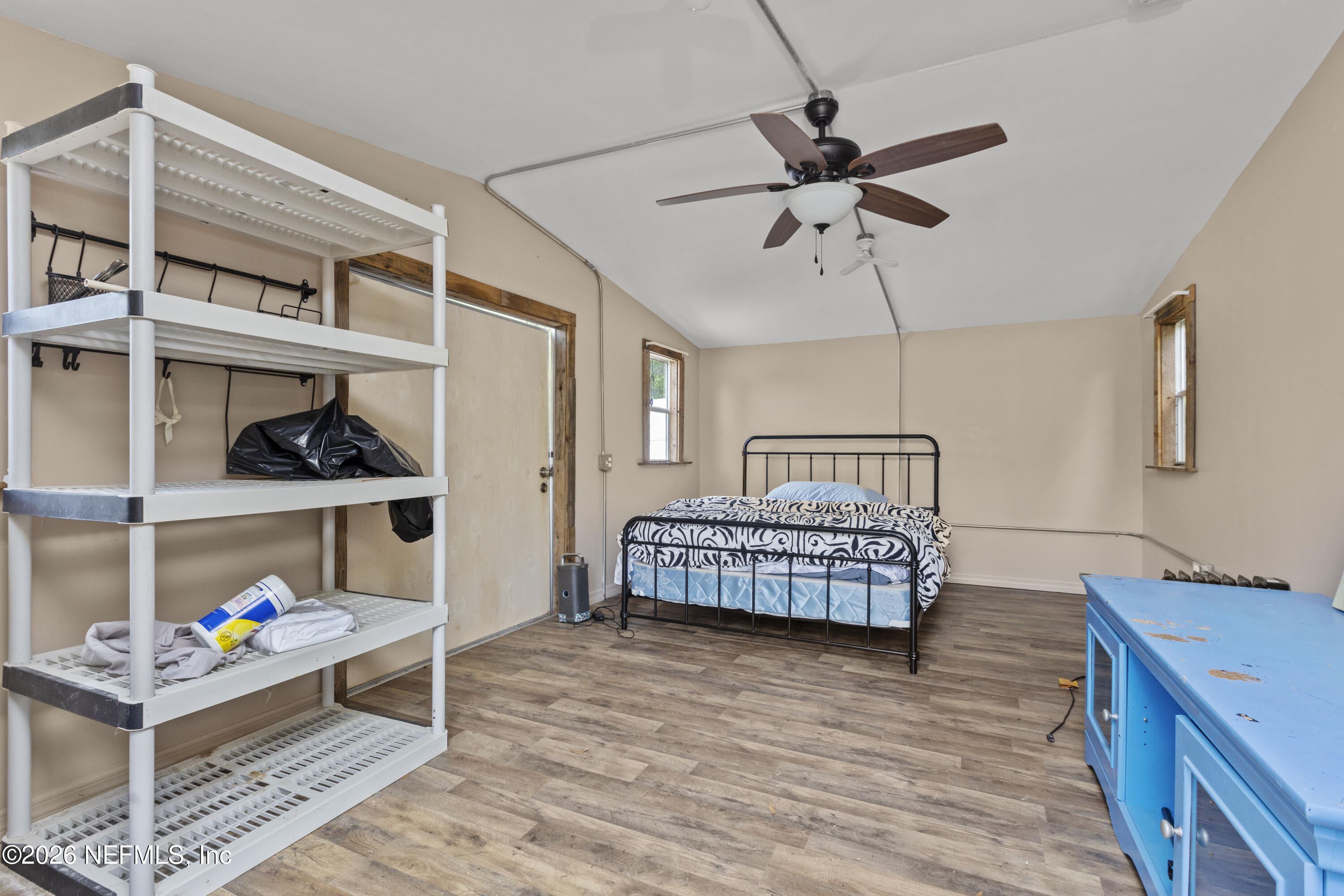 155 Roddy Road Palatka, FL 32177 - Photo 35 of 41 a bedroom with a bed and a window
