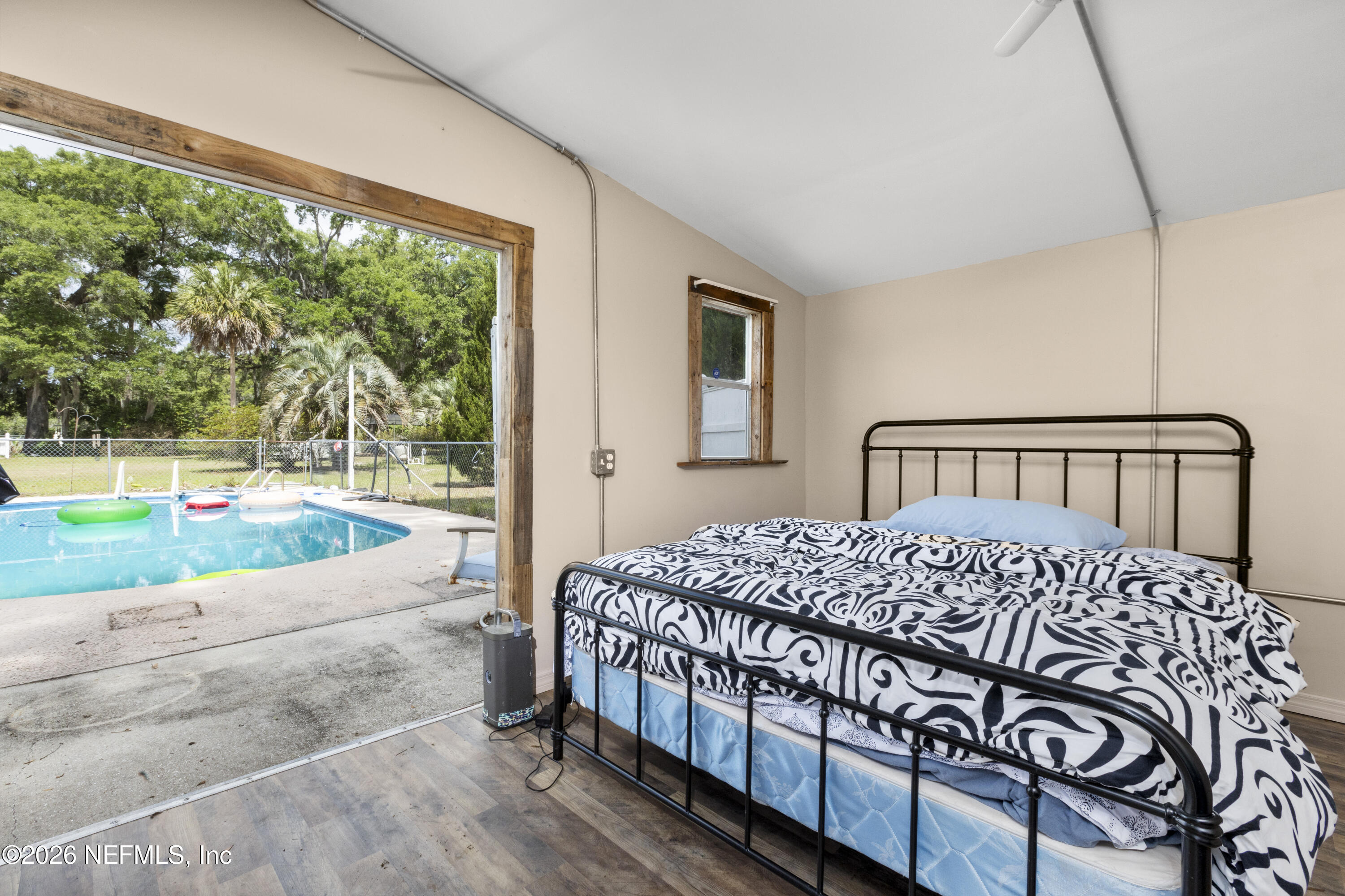 155 Roddy Road Palatka, FL 32177 - Photo 37 of 41 a bedroom with a bed and a window