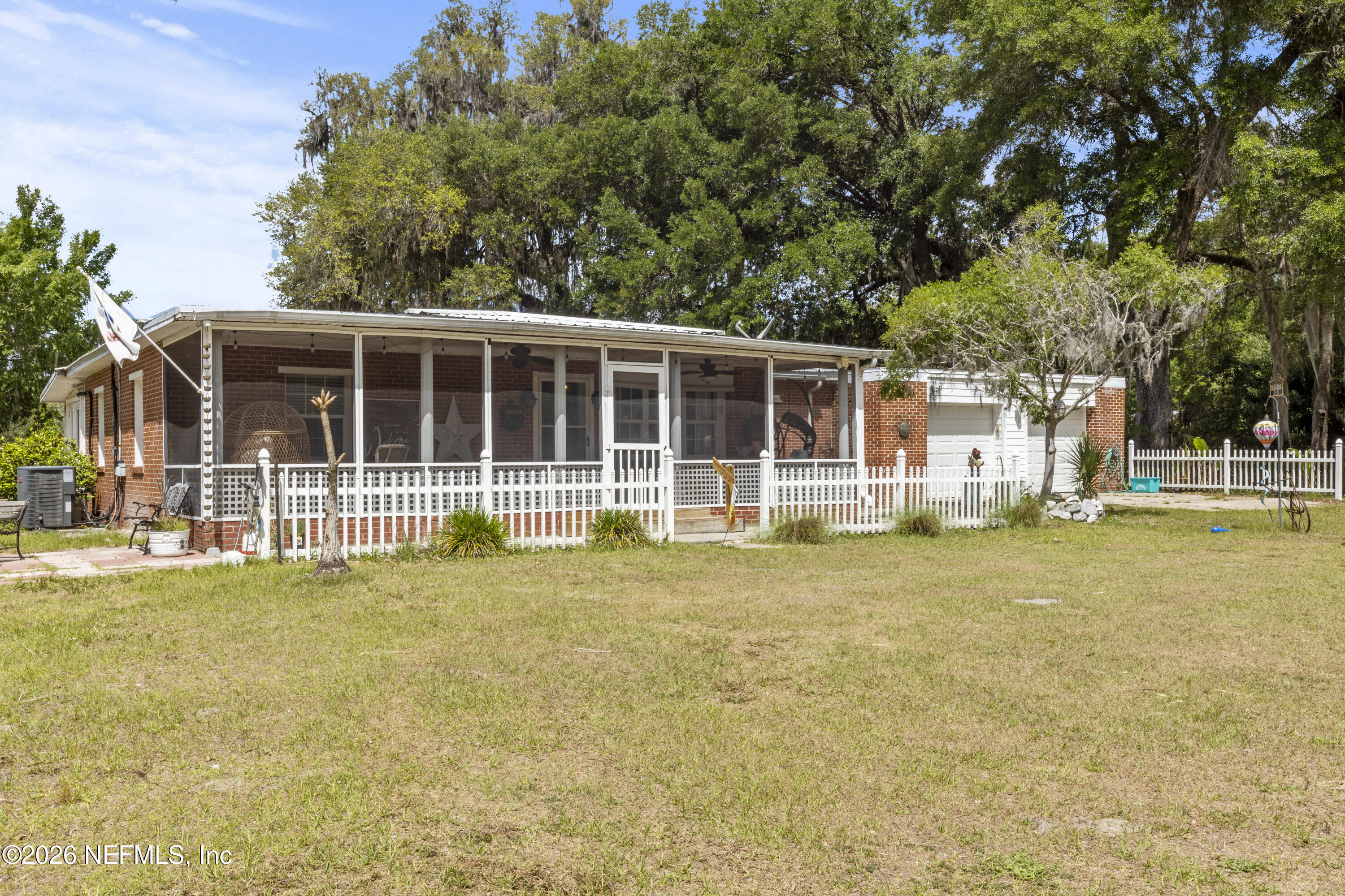 155 Roddy Road Palatka, FL 32177 - Photo 40 of 41 a view of a house with pool and sitting area