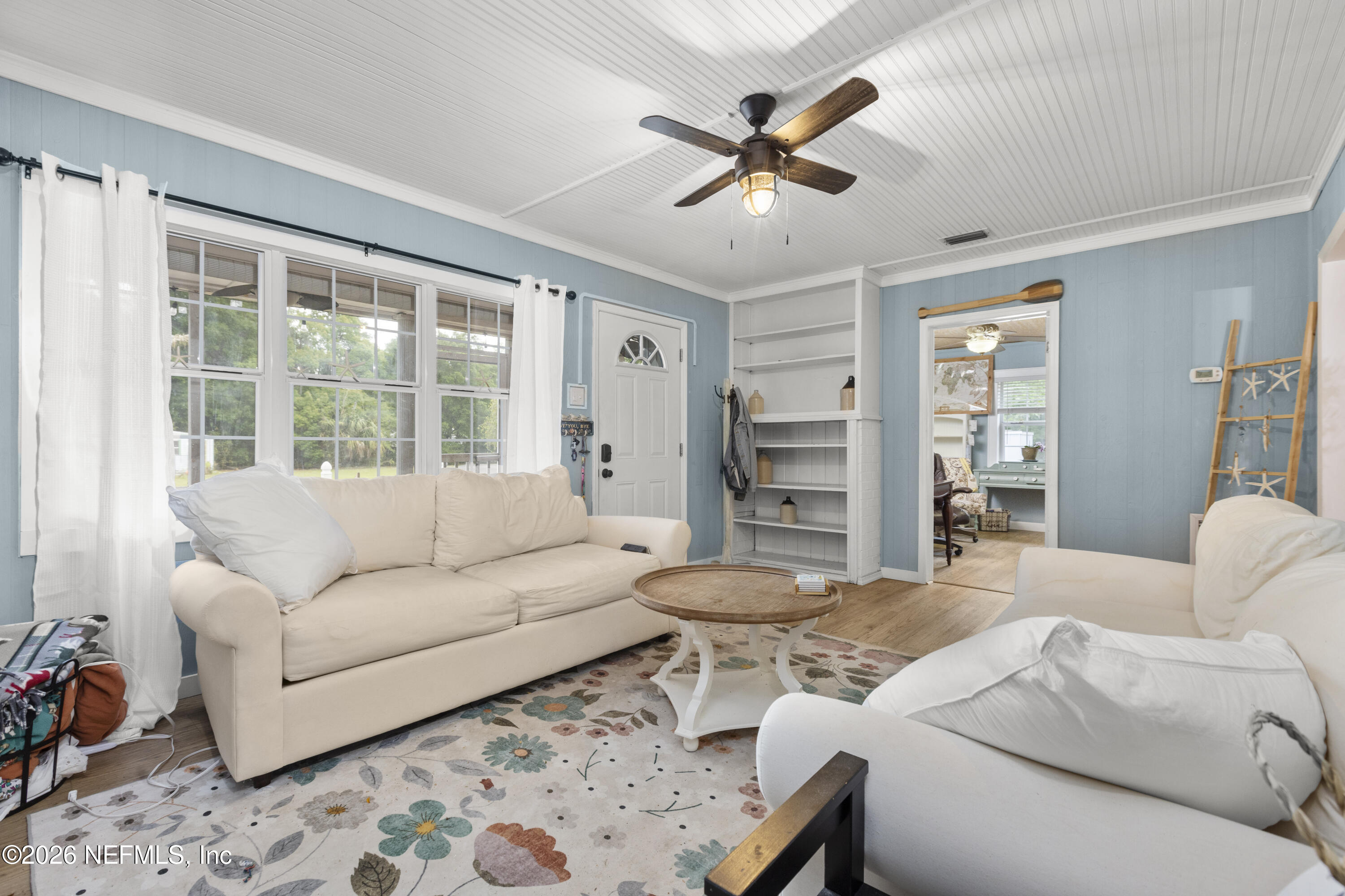 155 Roddy Road Palatka, FL 32177 - Photo 6 of 41 a living room with furniture and a window