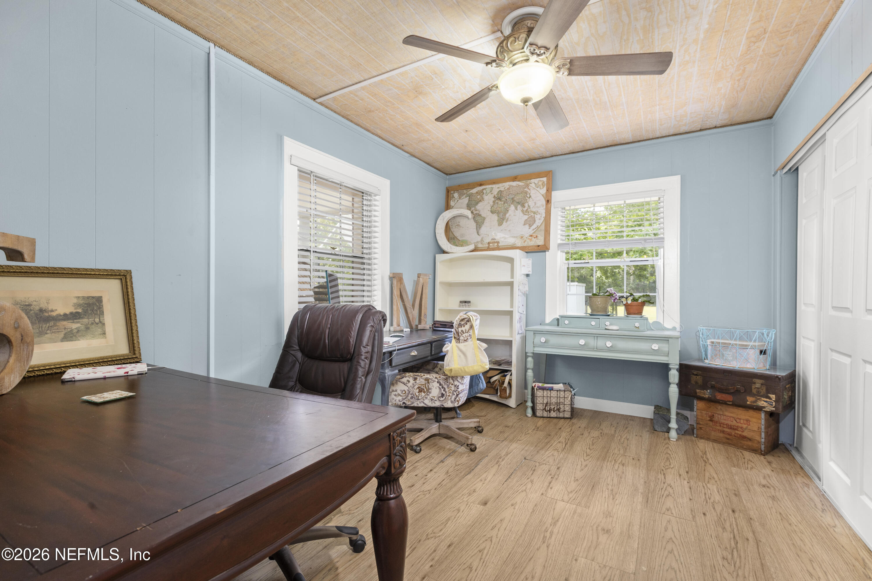 155 Roddy Road Palatka, FL 32177 - Photo 8 of 41 a workspace with furniture window and wooden floor