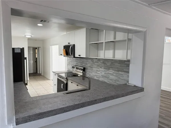 a view of a room that has a window