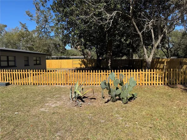 a house view with a garden space