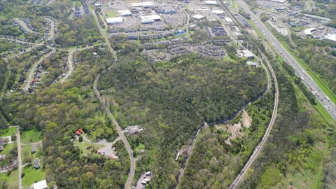 a view of a yard from a balcony