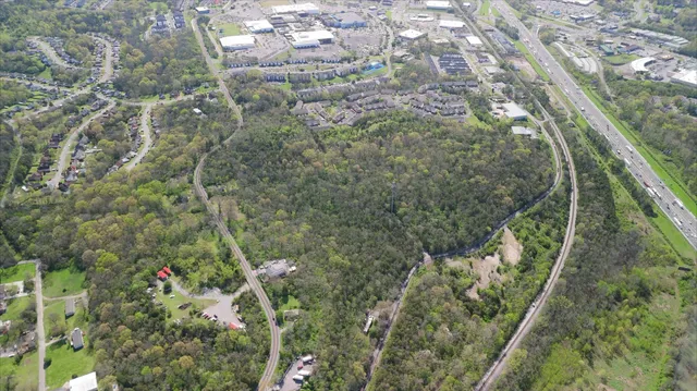 a view of a yard from a balcony