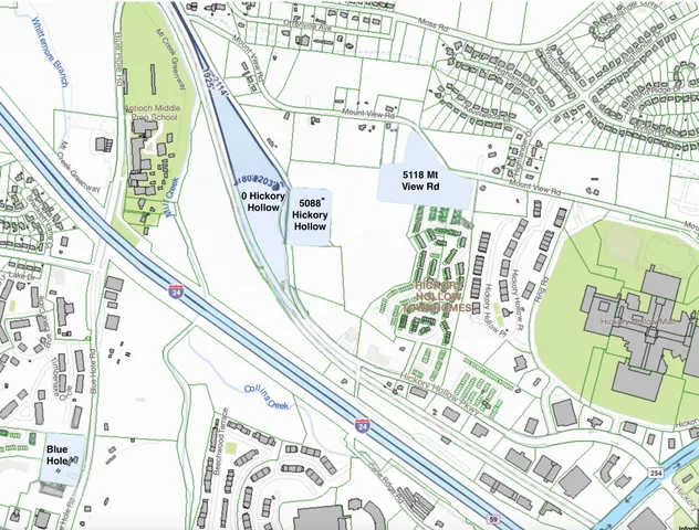 a picture of a bathroom with a shower curtain