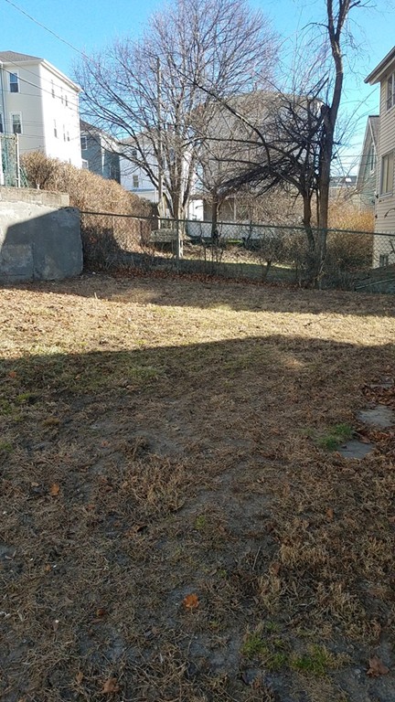 69 East Central Street Worcester, MA 01605 - Photo 2 of 12 a view of a yard with a house