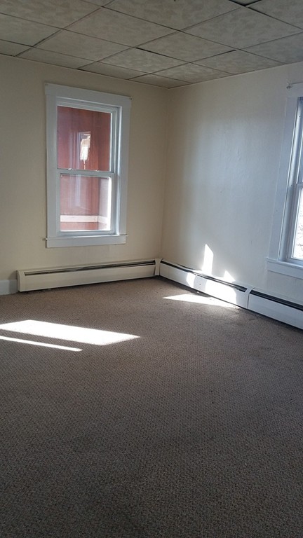 69 East Central Street Worcester, MA 01605 - Photo 9 of 12 a view of empty room with window