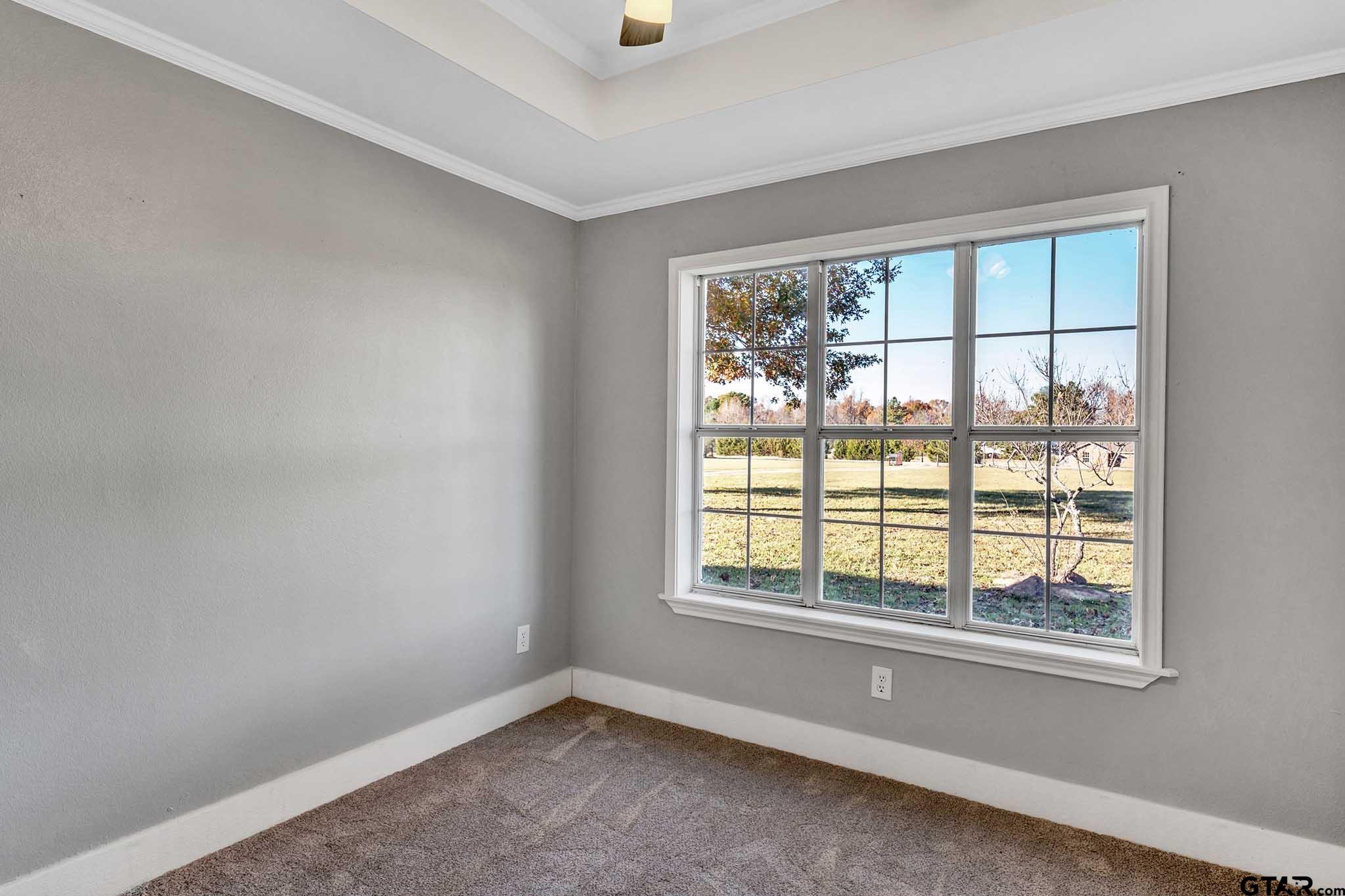 11670 Cr 345 Winona Tx 75792 Winona, TX 75792 - Photo 14 of 39 a view of an empty room with a window