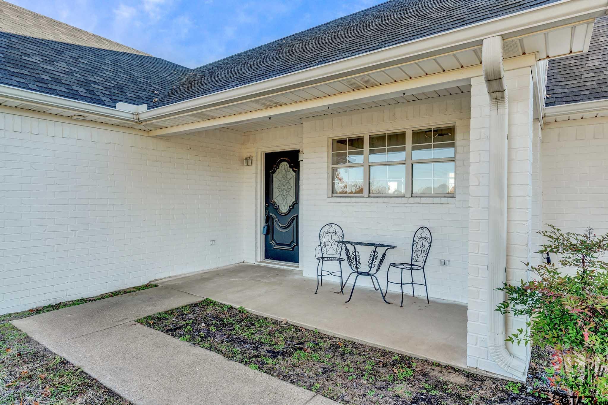 11670 Cr 345 Winona Tx 75792 Winona, TX 75792 - Photo 22 of 39 a view of a patio with table and chairs and potted plants