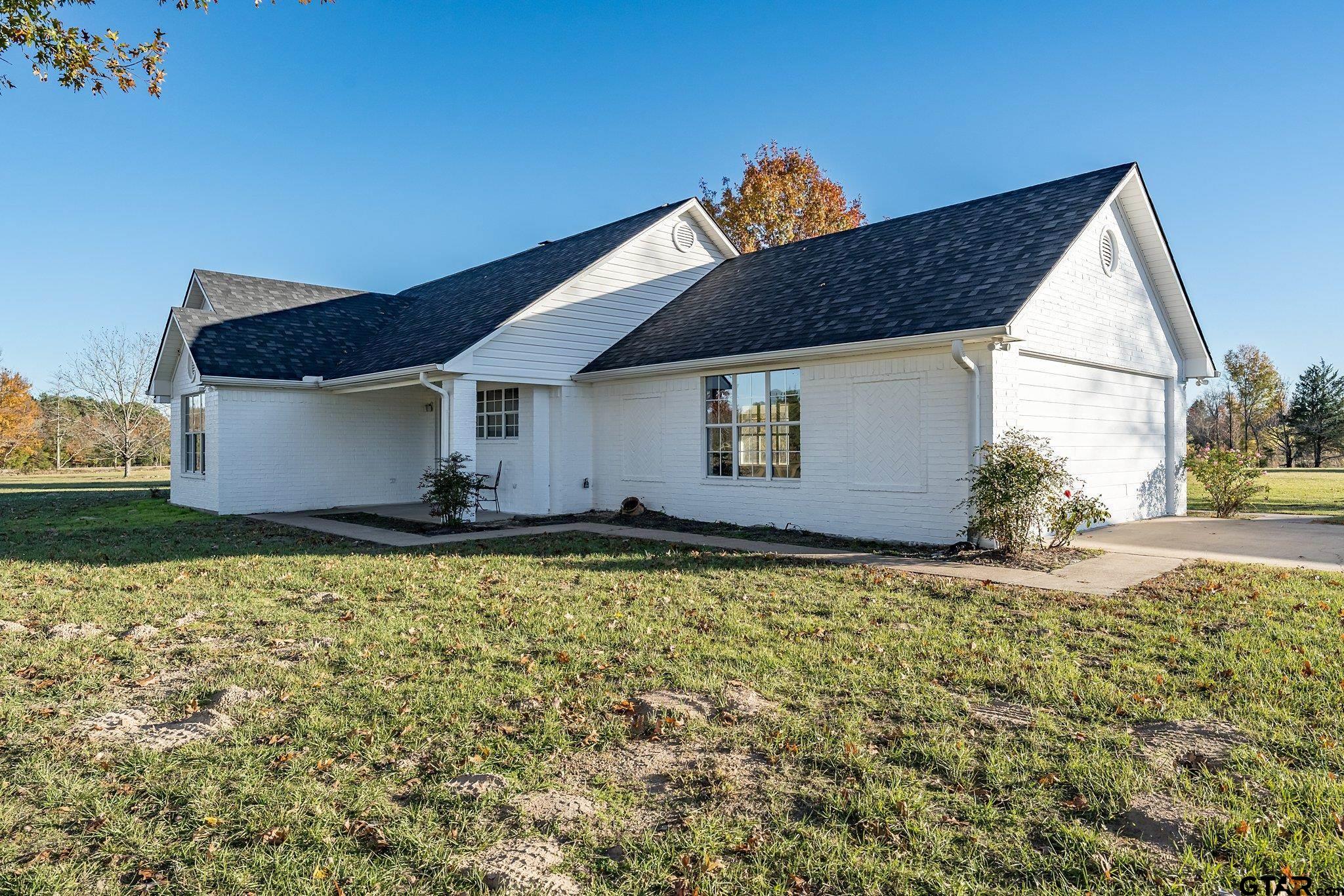 11670 Cr 345 Winona Tx 75792 Winona, TX 75792 - Photo 34 of 39 a view of a house with a yard