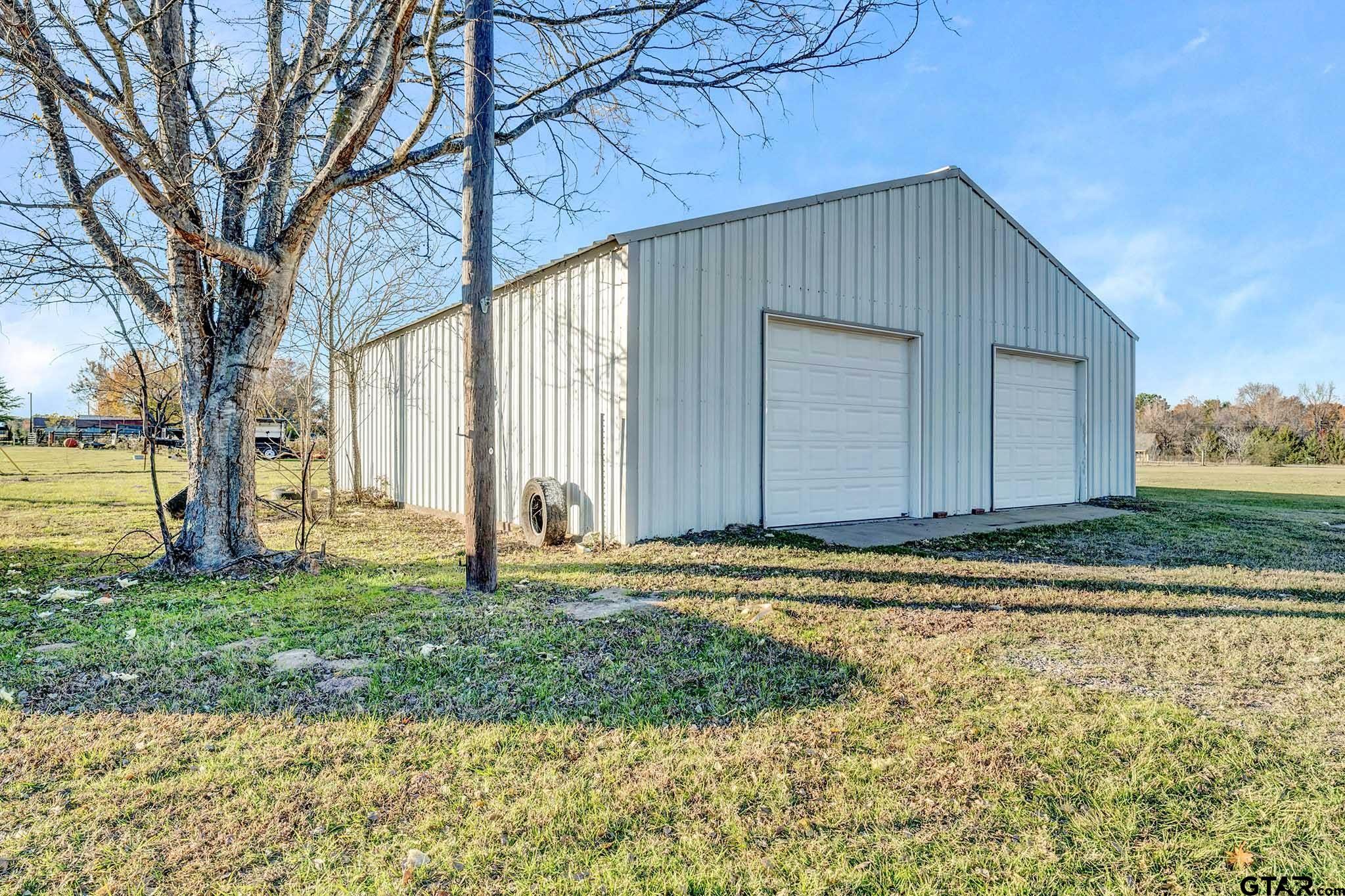 11670 Cr 345 Winona Tx 75792 Winona, TX 75792 - Photo 36 of 39 a house with trees in front of it