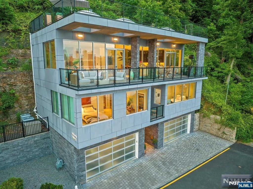 a front view of a house with balcony