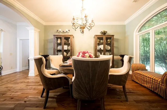 a kitchen with stainless steel appliances granite countertop a stove and a refrigerator
