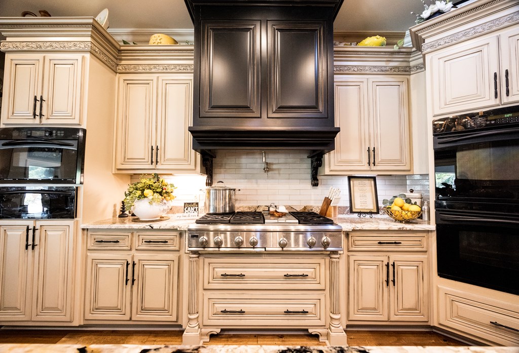 595 Grey Rock Drive Midland, GA 31820 - Photo 20 of 95 a kitchen with stainless steel appliances granite countertop a stove and a refrigerator