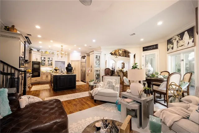 a bedroom with furniture and a gym equipment