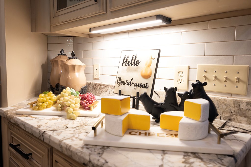 595 Grey Rock Drive Midland, GA 31820 - Photo 29 of 95 a bathroom with a granite countertop sink and a mirror