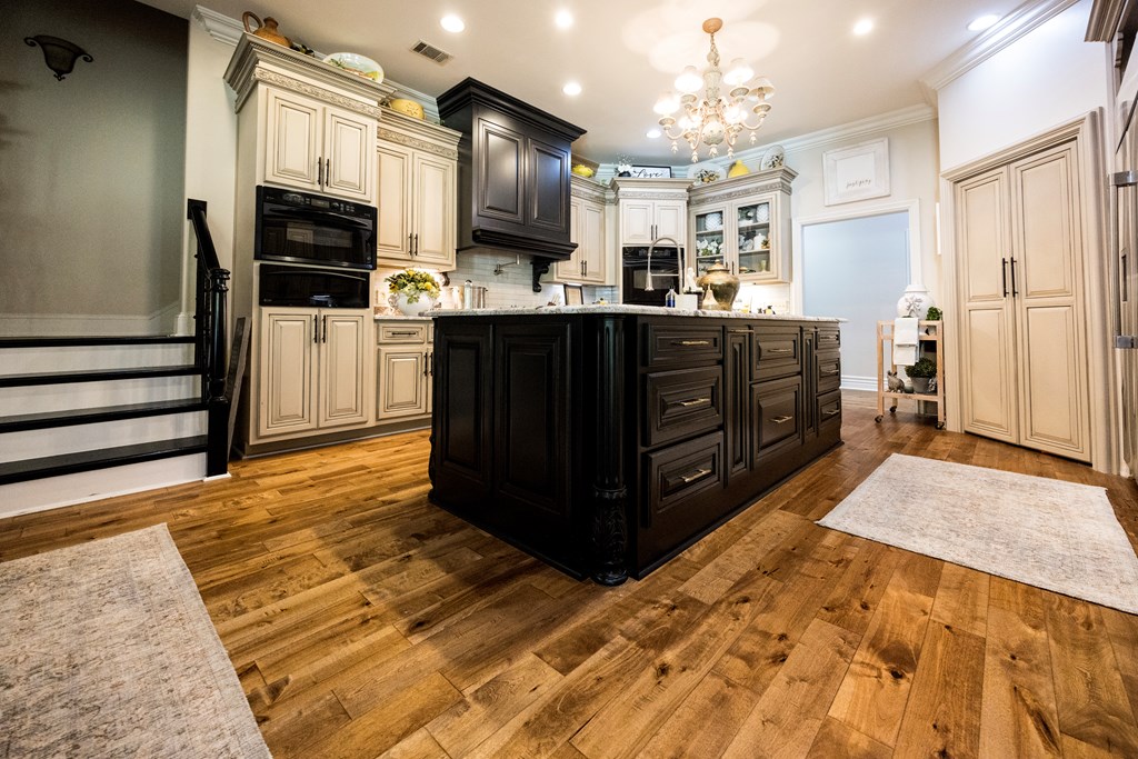 595 Grey Rock Drive Midland, GA 31820 - Photo 31 of 95 a kitchen with stainless steel appliances kitchen island granite countertop a refrigerator and microwave