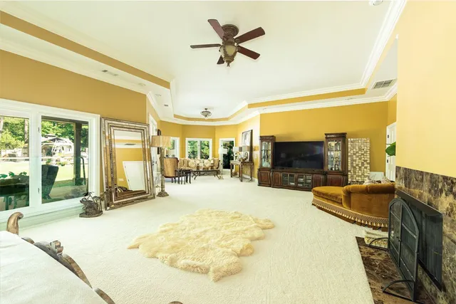 a view of a house with swimming pool in front of it