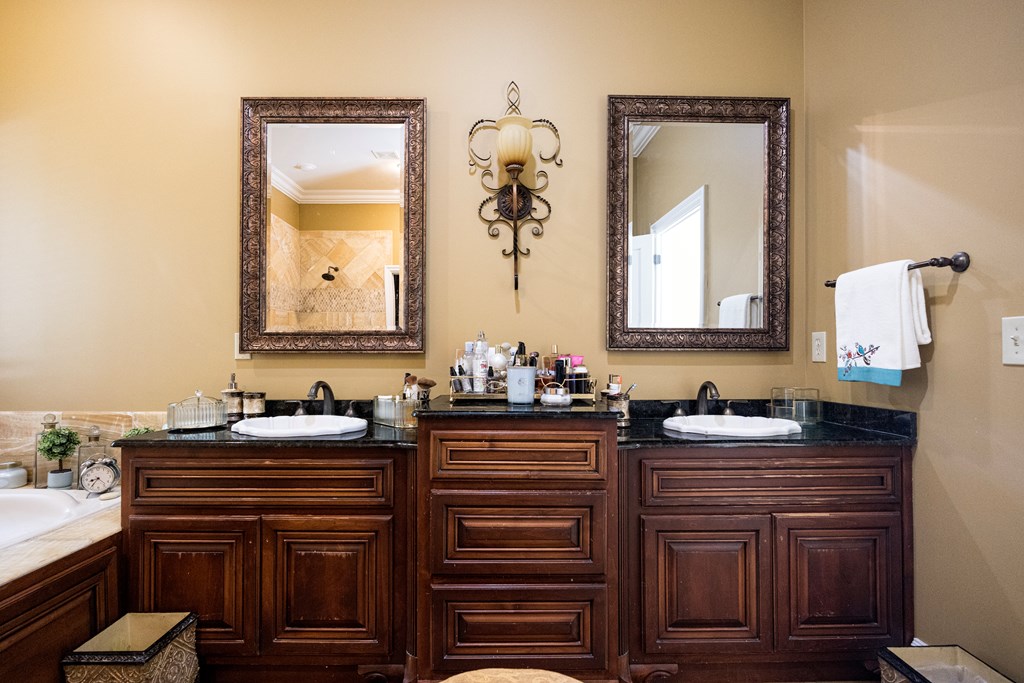 595 Grey Rock Drive Midland, GA 31820 - Photo 48 of 95 a bathroom with a sink and a mirror
