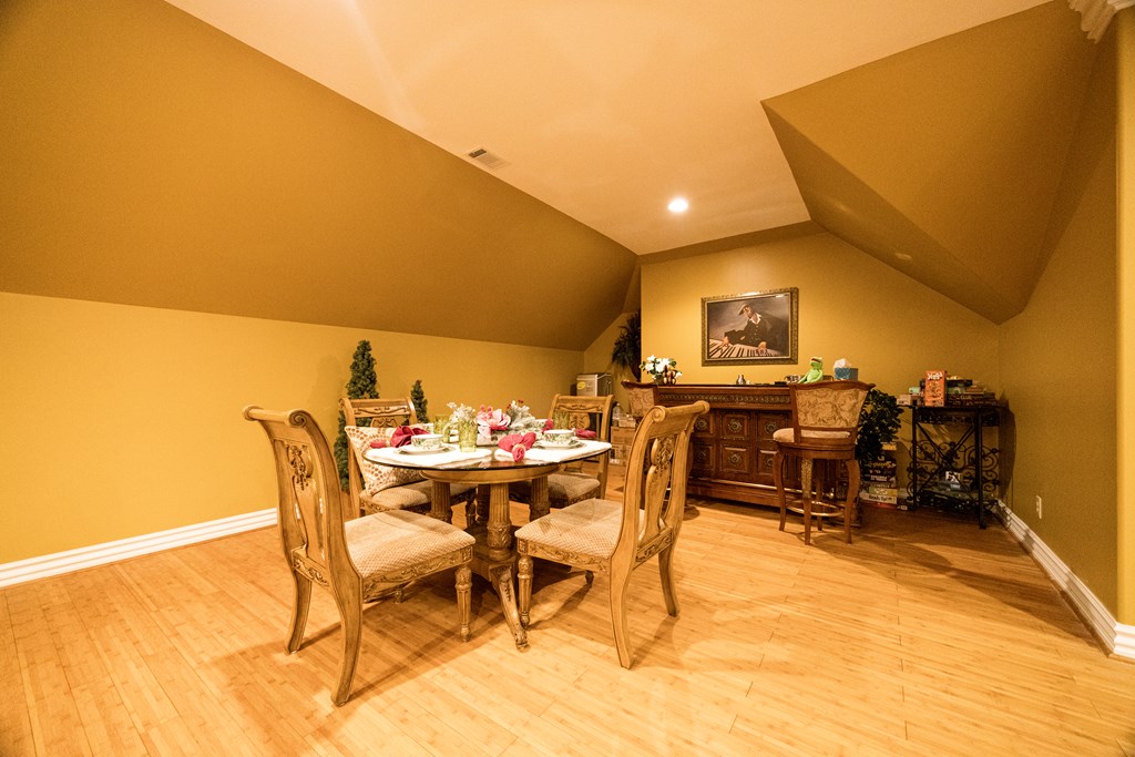 595 Grey Rock Drive Midland, GA 31820 - Photo 68 of 95 a view of a dining room with furniture and a kitchen view