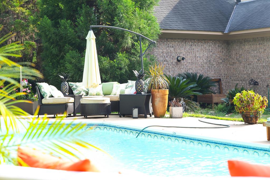 595 Grey Rock Drive Midland, GA 31820 - Photo 74 of 95 a view of a swimming pool with a patio
