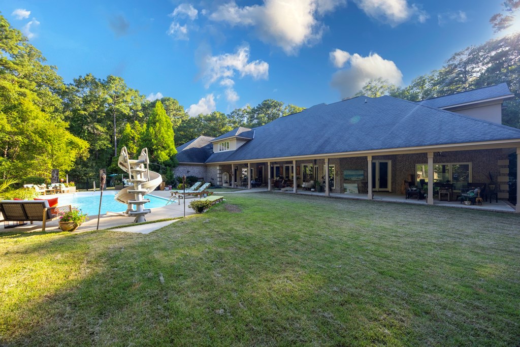 595 Grey Rock Drive Midland, GA 31820 - Photo 78 of 95 a view of house with outdoor space and swimming pool