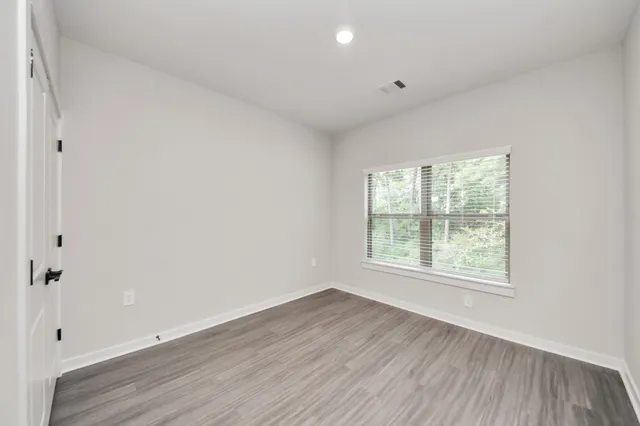 $1,729 | 7711 Longmire Road, Unit 102, Conroe, TX 77304