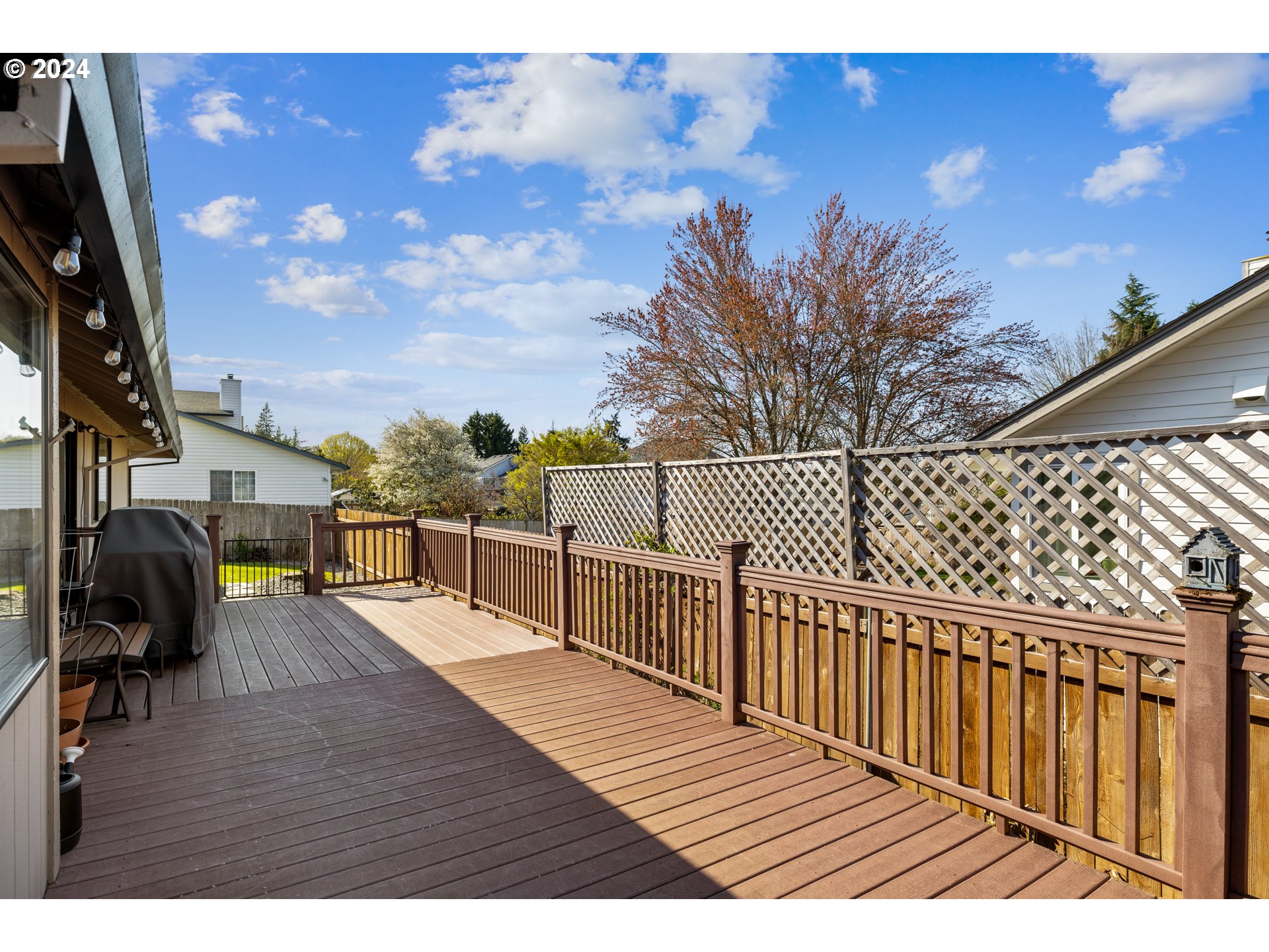 2718 Northeast 164th Street Ridgefield, WA 98642 - Photo 27 of 33 a view of a balcony with wooden chairs